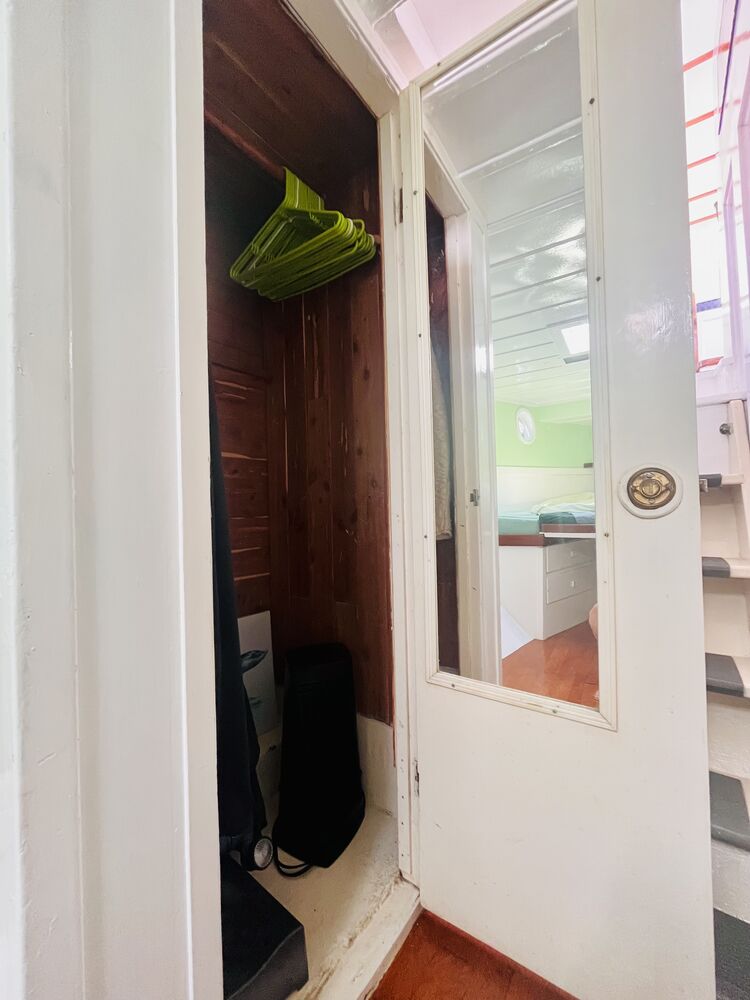 The cedar-lined hanging locker in the stateroom.